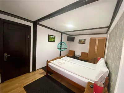 REDUCERE PRET - VAND PENSIUNE CU 7 CAMERE IN SIGHISOARA LA 800 MP DE CETATE - foto 13