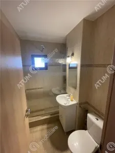 De inchiriat apartament cu 3 camere decomandate si balcon in zona Vasile Aaron din Sibiu - foto 12