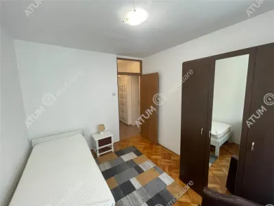 De inchiriat apartament cu 3 camere decomandate si pivnita in zona Strand din Sibiu - foto 7