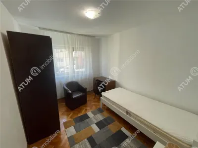 De inchiriat apartament cu 3 camere decomandate si pivnita in zona Strand din Sibiu - foto 8
