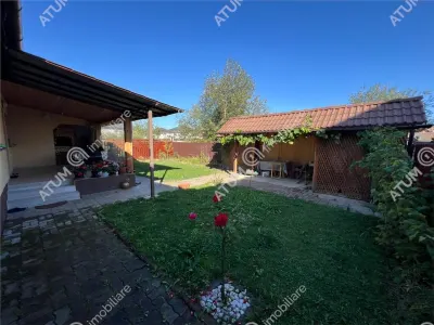 De vanzare casa cu 3 camere pivnita si pod amplasata pe teren de 438 mp zona Calea Cisnadiei din Sibiu - foto 12